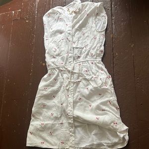 White sleeveless button down dress with cherries on the dress and tie